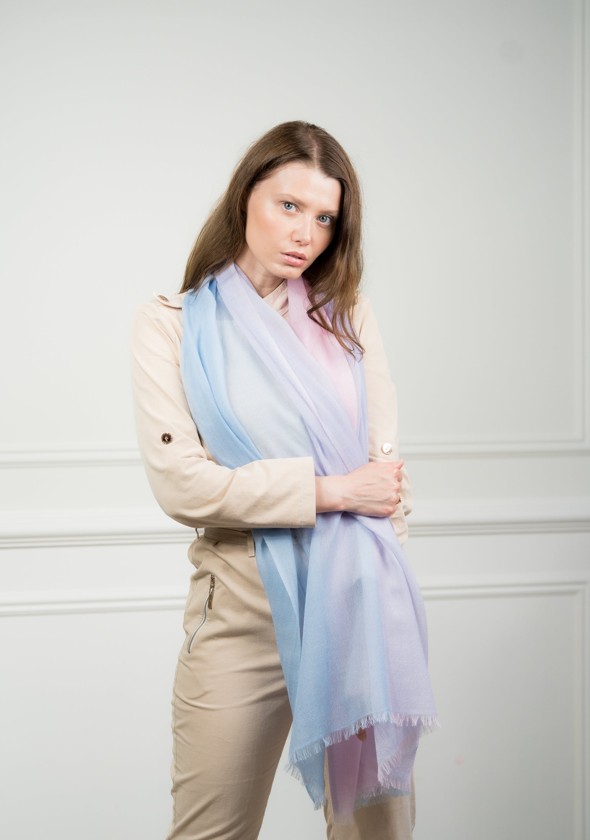 Full view of the pure wool scarf featuring four color blocks—azure, teal, beige, and gray—displayed flat to show the complete design.