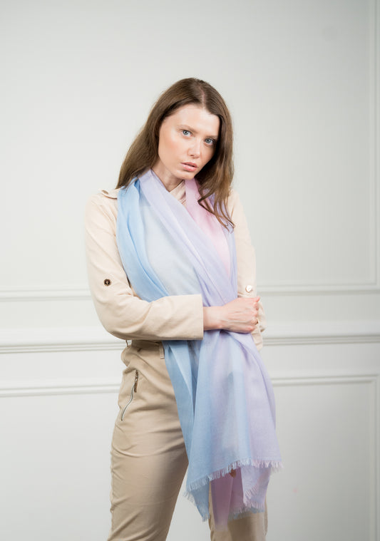 Full view of the pure wool scarf featuring four color blocks—azure, teal, beige, and gray—displayed flat to show the complete design.