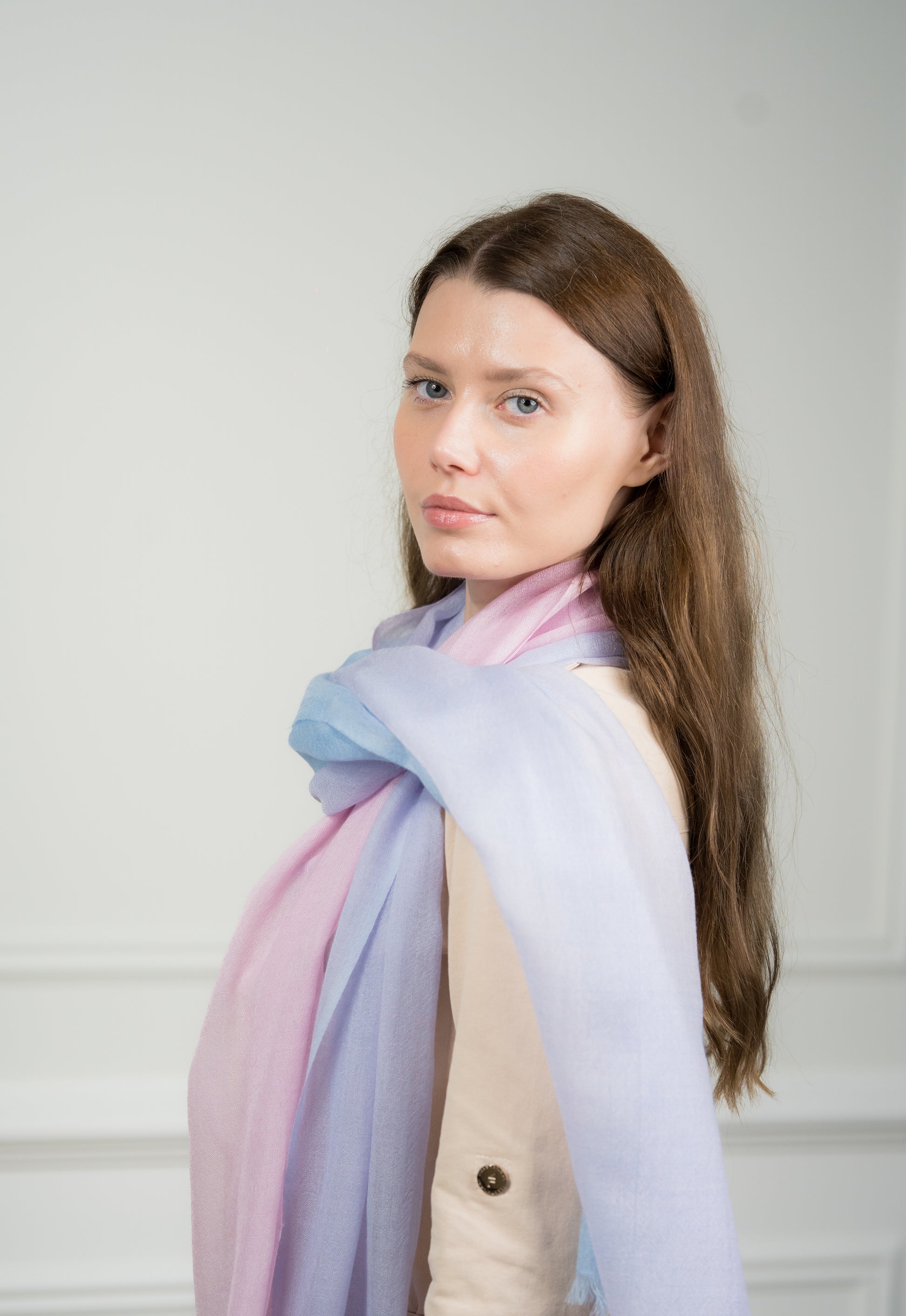 Detailed shot focusing on the texture of the pure wool material, showcasing the weave and softness of the scarf.
