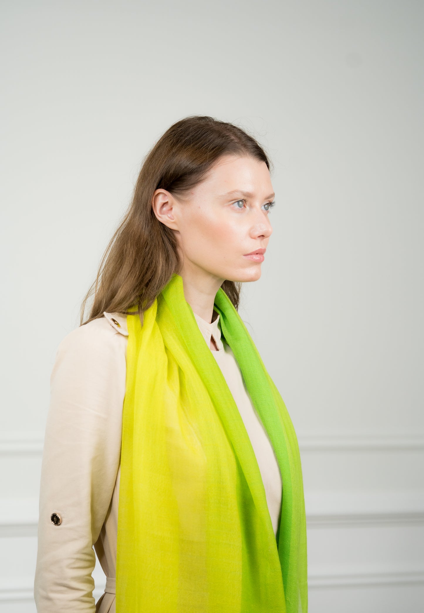 Model draping the lightweight 4 Color Block Chartreuse Scarf over shoulders, highlighting the bold chartreuse and soft beige tones.