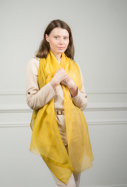 Close-up of the 4 Color Block Lemon Scarf on a model, highlighting the soft wool texture and transition between lemon yellow and gray blocks.