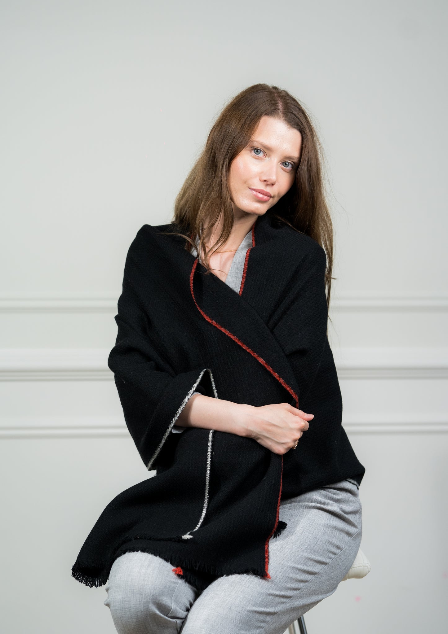 Caprus Cashmere's Zigzag with Border Shawl displayed flat, showcasing its intricate zigzag pattern and contrasting border, perfect for adding a stylish touch to any outfit.