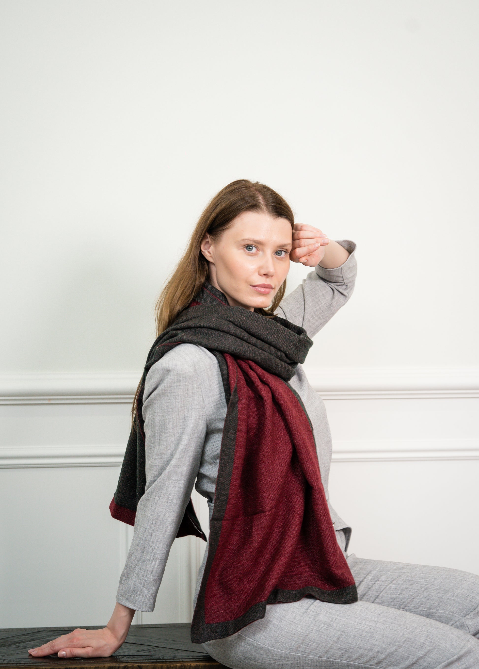 Detailed view of the Ristic Red Two Tone Scarf's fringed edges, emphasizing Caprus Cashmere's craftsmanship and suitability as a luxurious accessory.