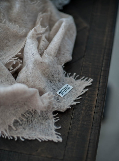 Soft natural-fibre textile featured in the Caprus care guide