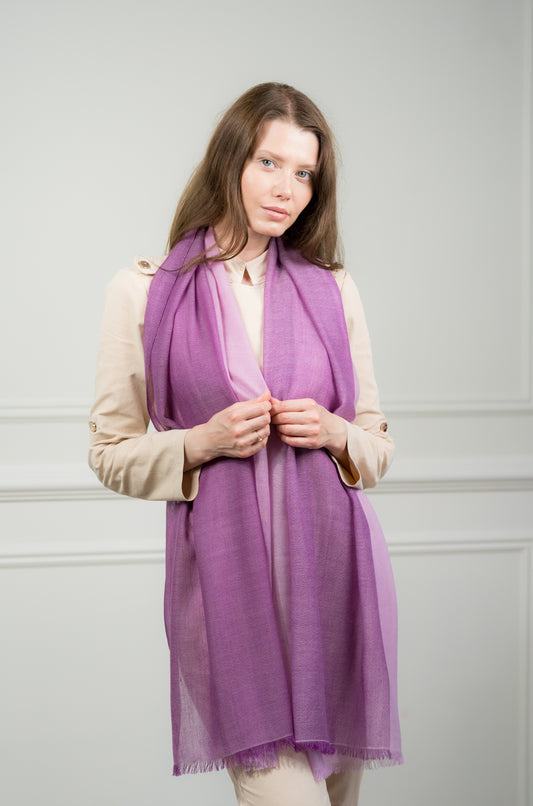 Model wearing Caprus Cashmere's pure wool 4 Color Block Lilac Scarf, featuring lilac, gray, beige, and white color blocks.