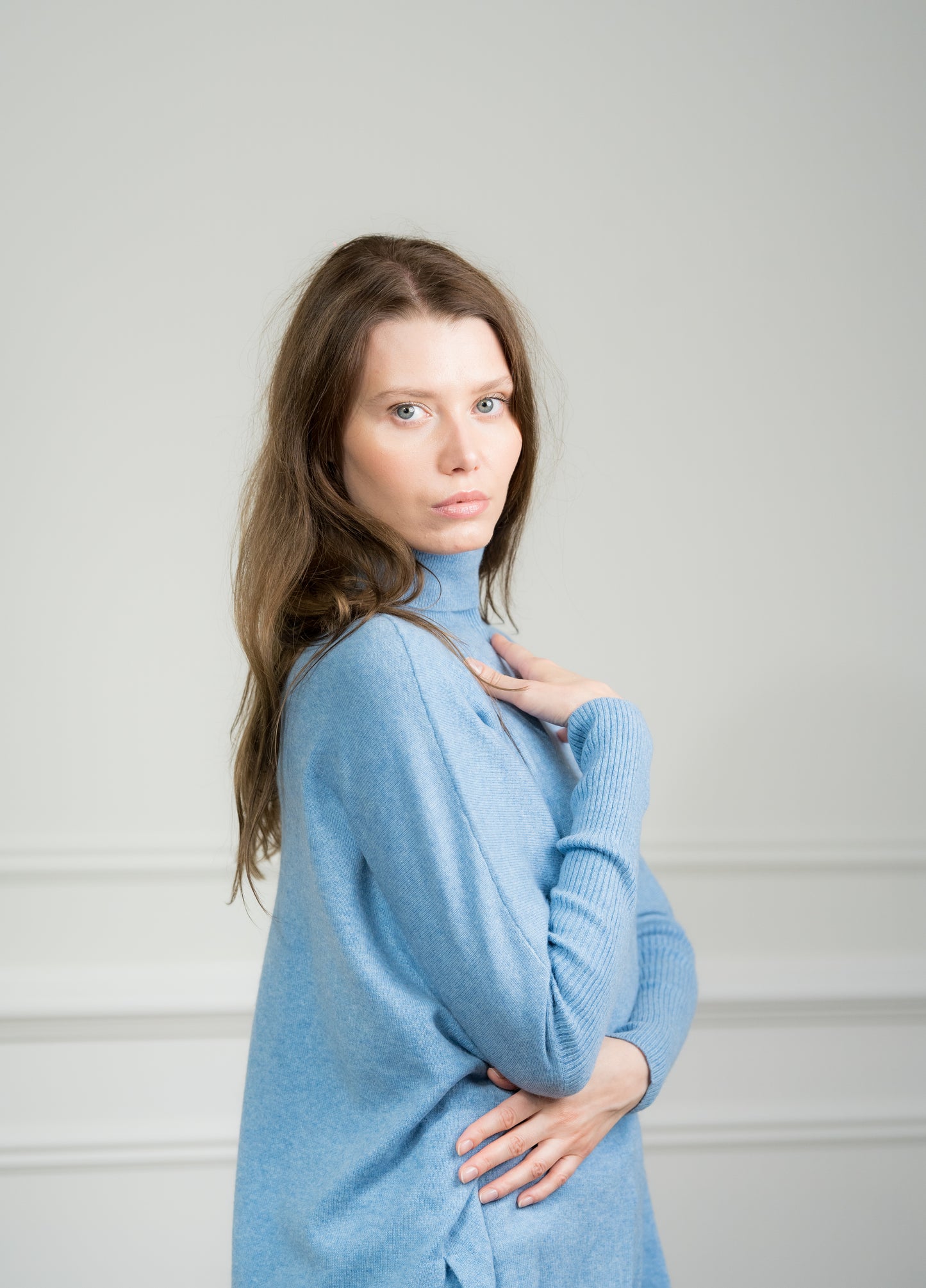 Back view of the Sky Boxy Sweater on a model, displaying the seamless construction and quality craftsmanship.