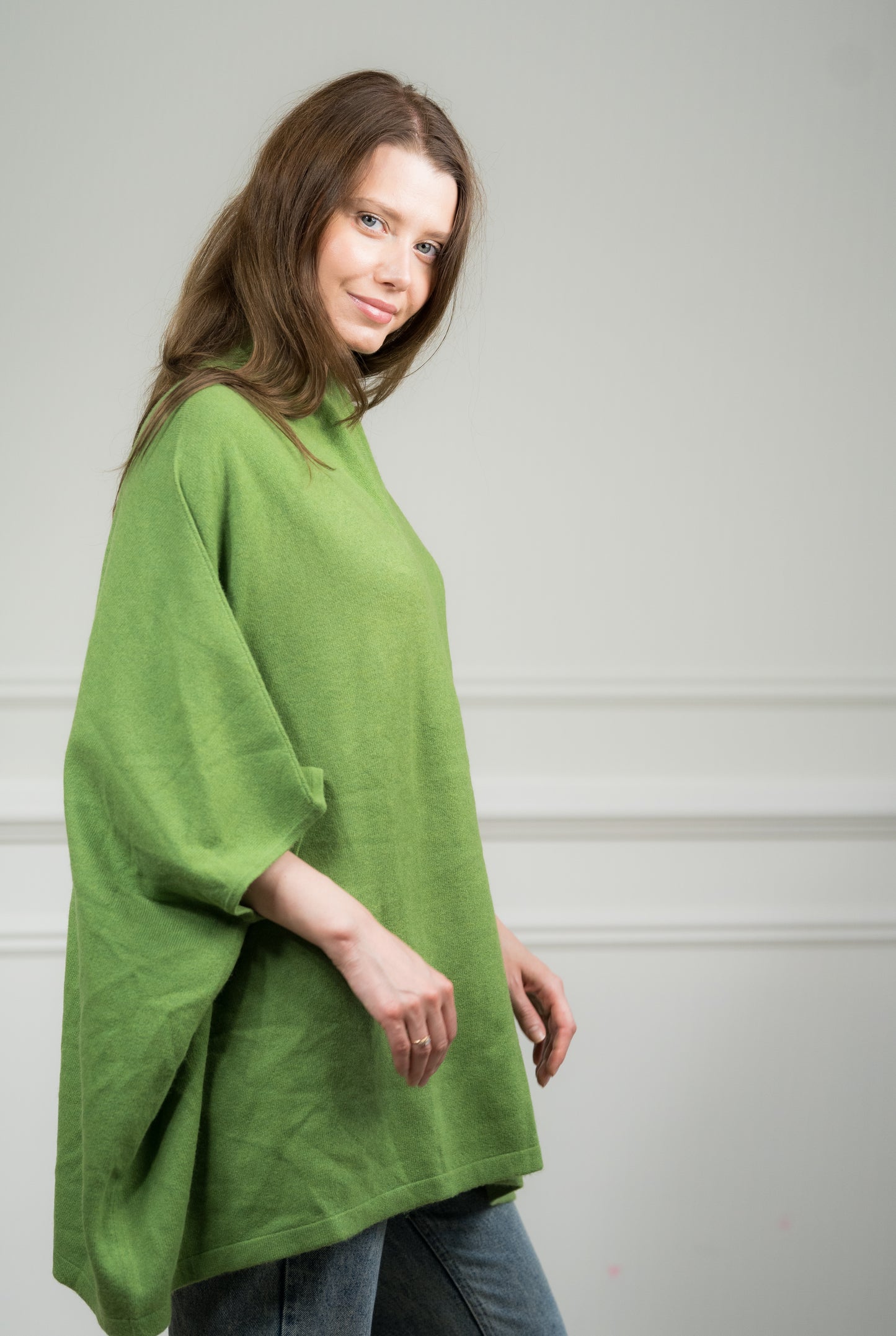 Model displaying the Jade Cashmere Kimono's flowy silhouette, perfect as a women's wrap for travel or gifting.