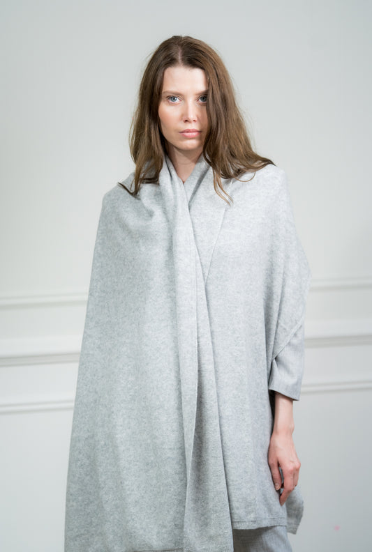 Close-up of the Silver Travel Wrap, highlighting the fine knit and luxurious feel of the pure cashmere material.