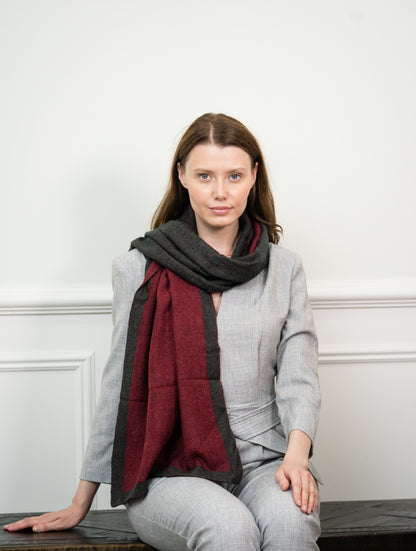 Caprus Cashmere's Ristic Red Two Tone Scarf displayed flat, showcasing its vibrant red and khaki color combination, perfect for adding a bold accent to any outfit.