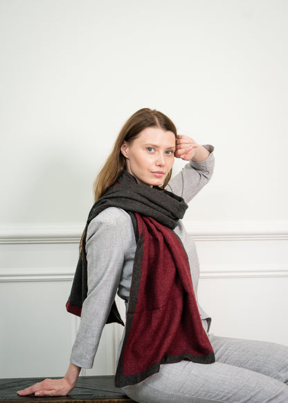 Detailed view of the Ristic Red Two Tone Scarf's fringed edges, emphasizing Caprus Cashmere's craftsmanship and suitability as a luxurious accessory.